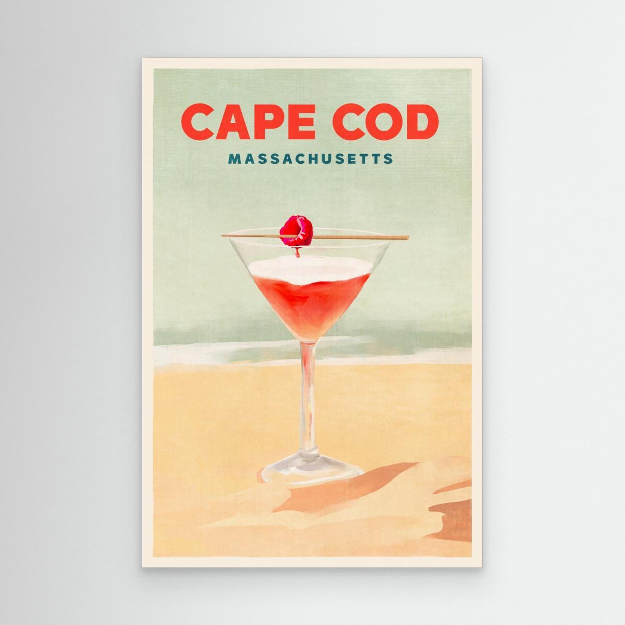 Print of a cocktail with a cherry on top, labeled 'Cape Cod, Massachusetts', on a beach background.