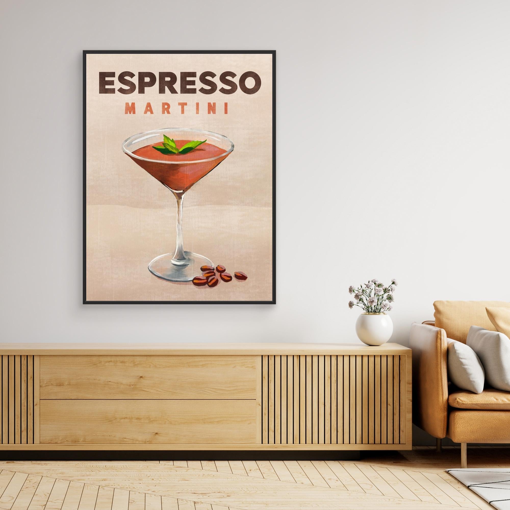 Framed print  of an Espresso Martini on a wall above a wooden cabinet.