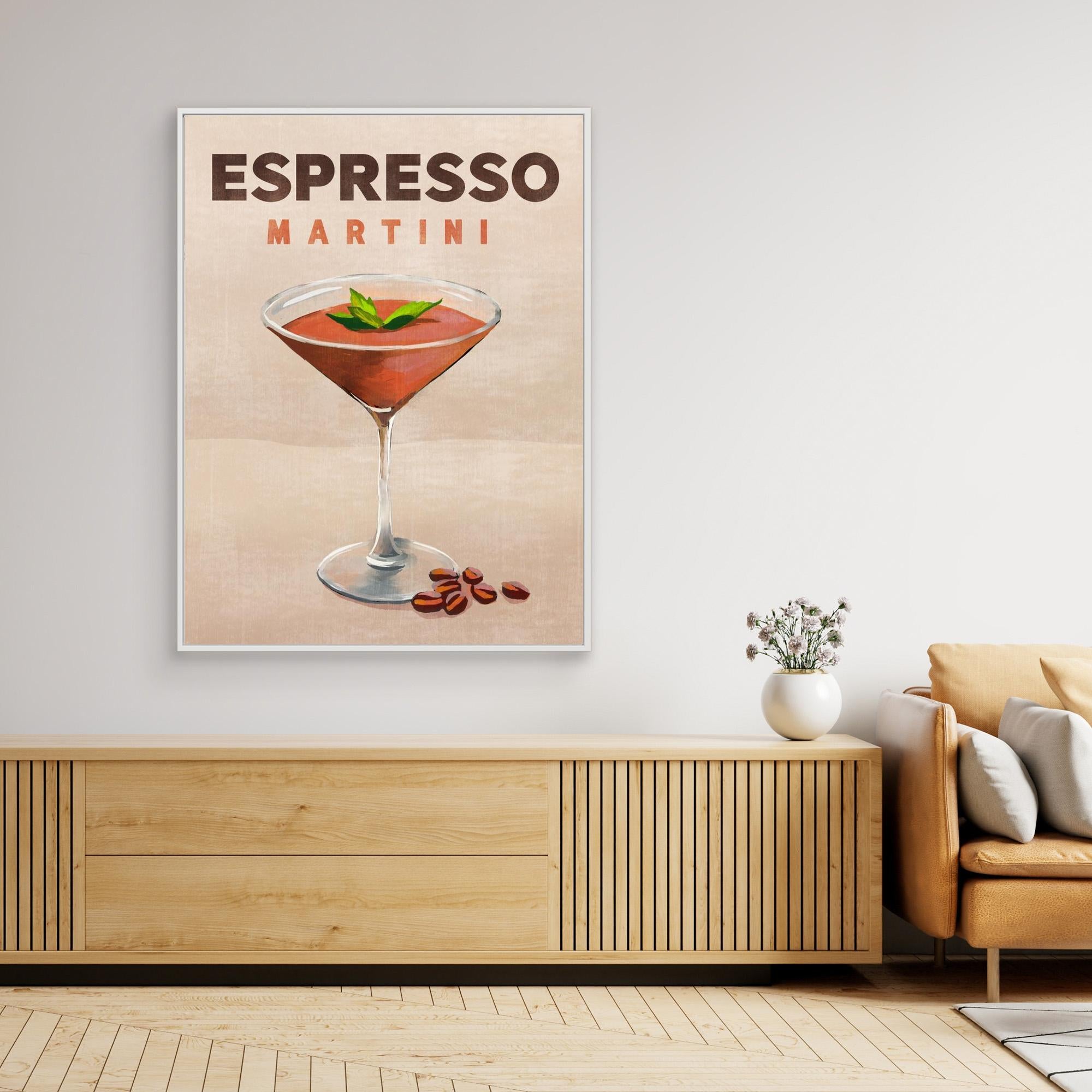 Framed print  of an Espresso Martini on a wall above a wooden cabinet.