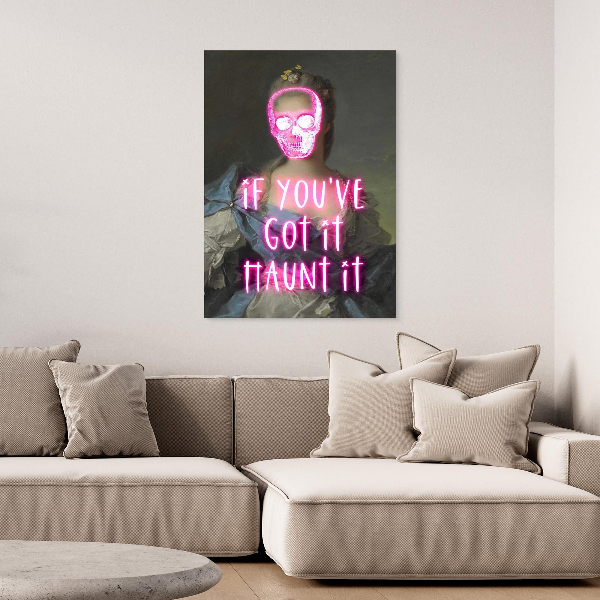 Neon sign art on a wall above a beige sofa with decorative pillows.