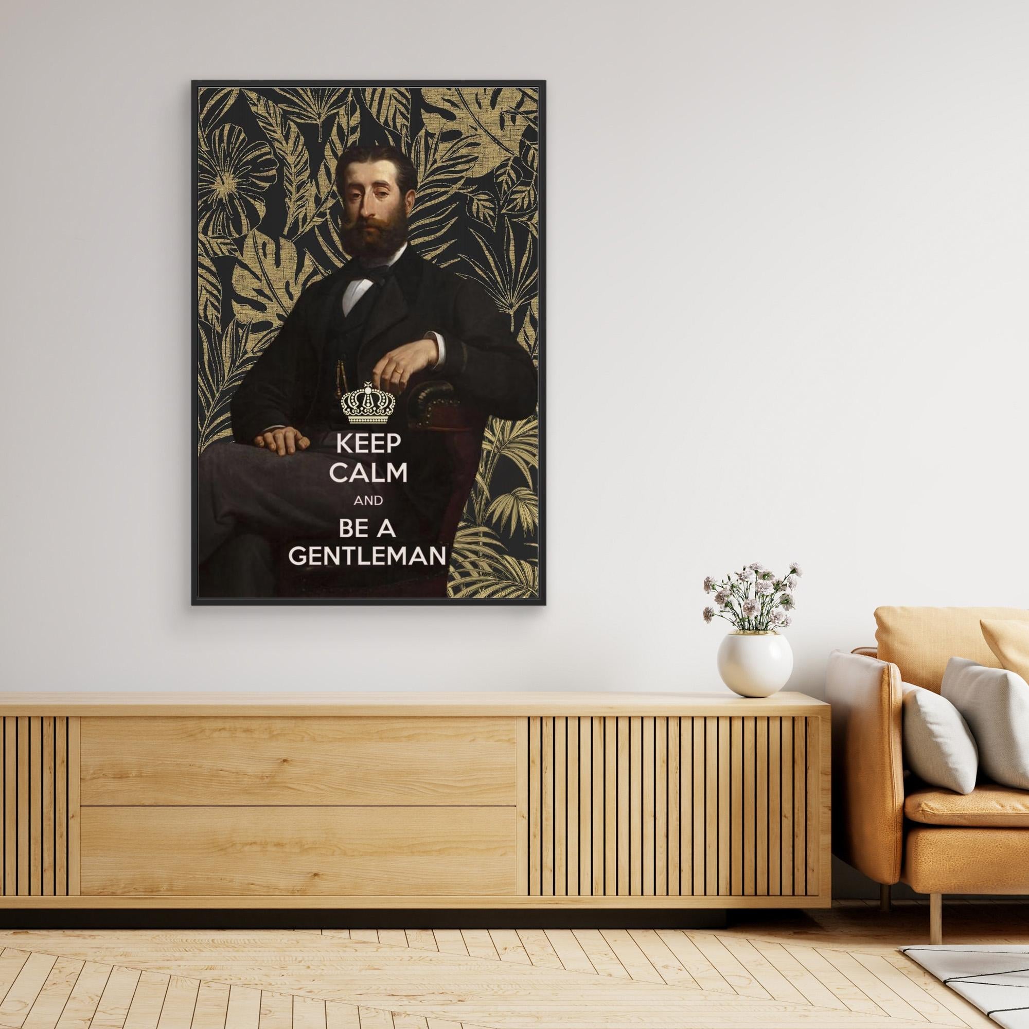 Framed portrait of a man with decorative elements and text 'Keep Calm and Be a Gentleman' in a living room setting.